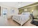 Comfortable bedroom featuring a coastal-inspired aesthetic and ocean views at 1290 Gulf Blvd # 702, Clearwater Beach, FL 33767
