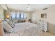 Bright bedroom with large window, quaint furnishings and decorative accents at 1290 Gulf Blvd # 702, Clearwater Beach, FL 33767