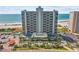 High-rise beachfront condo building with parking, pool, and tennis courts at 1290 Gulf Blvd # 702, Clearwater Beach, FL 33767