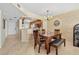 Comfortable dining area with seamless flow into an open kitchen, fostering a welcoming ambiance and culinary convenience at 1290 Gulf Blvd # 702, Clearwater Beach, FL 33767