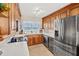 Modern kitchen featuring stainless steel appliances and ample counter space, perfect for cooking and entertaining guests at 1290 Gulf Blvd # 702, Clearwater Beach, FL 33767