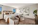 Elegant bedroom with neutral tones, stylish seating area, and bright natural lighting at 14819 Summer Branch Dr Dr, Lithia, FL 33547