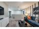 Upstairs loft area with a sofa and wall-mounted television at 14819 Summer Branch Dr Dr, Lithia, FL 33547