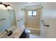 Bathroom featuring a shower and vanity with a sink at 15028 Redcliff Dr, Tampa, FL 33625