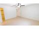 Neutral bedroom with a ceiling fan and easy access to closet space at 15028 Redcliff Dr, Tampa, FL 33625