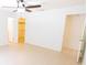 Light bedroom featuring an overhead fan, closet, and neutral walls at 15028 Redcliff Dr, Tampa, FL 33625