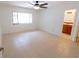 Bright main bedroom features tile floors with bathroom access at 15028 Redcliff Dr, Tampa, FL 33625