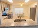 Beautiful kitchen featuring stone countertops and stainless steel appliances at 15028 Redcliff Dr, Tampa, FL 33625