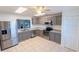 Modern kitchen with stainless steel appliances and eat-in counter at 15028 Redcliff Dr, Tampa, FL 33625