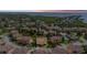 Scenic aerial view of waterfront community with stunning sunset and serene surroundings at 1536 Ember Ln, Tarpon Springs, FL 34689