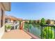 Balcony with views of the pond, landscaping, and community at 1536 Ember Ln, Tarpon Springs, FL 34689
