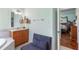 Bathroom with tile floors, vanity, and view to bedroom at 1536 Ember Ln, Tarpon Springs, FL 34689
