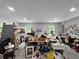 Spacious room featuring two windows and ample space for activities at 1609 Haven Bnd, Tampa, FL 33613