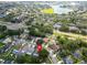 Aerial view of a home nestled among mature trees within a residential community at 1715 Larabie Ct, Brandon, FL 33511
