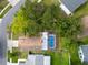 Overhead aerial of the home showcasing a screened in pool and a neatly maintained outdoor space at 1715 Larabie Ct, Brandon, FL 33511