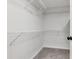 Walk-in closet featuring wire shelving at 18004 Clear Lake Dr, Lutz, FL 33548