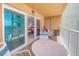 Enjoy outdoor living on this balcony with sliding glass doors and comfortable seating at 18610 Gulf Blvd # 607, Indian Shores, FL 33785