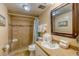 Tiled bathroom includes a shower and vanity with countertop space at 18610 Gulf Blvd # 607, Indian Shores, FL 33785