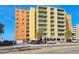 Multi-story condo building with balconies and parking at 18610 Gulf Blvd # 607, Indian Shores, FL 33785