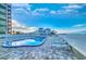 Enjoy this outdoor pool with lounge chairs next to the beach at 18610 Gulf Blvd # 607, Indian Shores, FL 33785