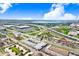Overhead view highlighting the building's location near major highways, shopping centers, and natural landscapes at 2001 E 2Nd Ave # 37, Tampa, FL 33605