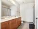 Bathroom with double vanity, modern fixtures, and tiled floor at 2001 E 2Nd Ave # 37, Tampa, FL 33605