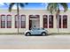 Stylish front of the property with colorful accents, ample parking, and modern appeal at 2001 E 2Nd Ave # 37, Tampa, FL 33605