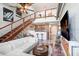 Open living space showcases the stairway to the loft with the kitchen in the background at 2001 E 2Nd Ave # 37, Tampa, FL 33605