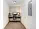 Functional office space with workstation, closet, and modern, minimalist design at 2001 E 2Nd Ave # 37, Tampa, FL 33605