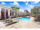The sparkling community pool features lounge furniture and a beautiful courtyard to relax and unwind at 2001 E 2Nd Ave # 37, Tampa, FL 33605