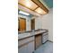 Bright bathroom featuring a double sink vanity and a modern ceiling fixture at 204 Oak Lake Dr, Spring Hill, FL 34608