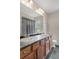 Bathroom includes double sink vanity, toilet and a tub/shower combination with window for natural light at 204 Oak Lake Dr, Spring Hill, FL 34608