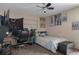 Bedroom with cozy carpet, ceiling fan, fun decor and ample natural light at 204 Oak Lake Dr, Spring Hill, FL 34608