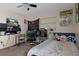 Bedroom with cozy carpet, ceiling fan, fun decor and ample natural light at 204 Oak Lake Dr, Spring Hill, FL 34608
