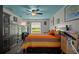 Cozy bedroom featuring neutral walls, and view of an outdoor space with a window at 204 Oak Lake Dr, Spring Hill, FL 34608