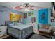 Bedroom with ceiling fan, natural light, and ample wall space for personalization at 204 Oak Lake Dr, Spring Hill, FL 34608
