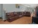 Comfortable living room featuring a large sectional sofa and inviting decor at 204 Oak Lake Dr, Spring Hill, FL 34608