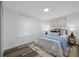 Cozy bedroom with ample natural light, neutral decor, and comfortable furnishings at 2326 Auburn S St, St Petersburg, FL 33712