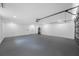 Spacious garage with storage capabilities, water heater, and ample natural light at 2326 Auburn S St, St Petersburg, FL 33712