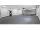 Large, organized garage with access door and spacious storage at 2326 Auburn S St, St Petersburg, FL 33712