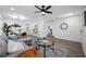 Expansive open-concept living area showcasing modern decor, sleek flooring, and abundant natural light for an inviting feel at 2326 Auburn S St, St Petersburg, FL 33712