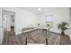 Bright office featuring desk space, bench, hardwood floors, and natural light at 2326 Auburn S St, St Petersburg, FL 33712