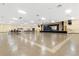 Spacious ballroom featuring a stage and ample room for gatherings and events at 2330 Ecuadorian Way # 30, Clearwater, FL 33763