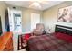 Bedroom features include wood look flooring, ceiling fan, and a comfortable chair at 2330 Ecuadorian Way # 30, Clearwater, FL 33763