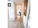 Hallway leading to bedrooms with modern wood-look flooring at 2330 Ecuadorian Way # 30, Clearwater, FL 33763