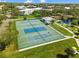 Aerial view of multiple tennis and pickleball courts with surrounding greenery at 2330 Ecuadorian Way # 30, Clearwater, FL 33763