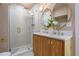 Stylish bathroom featuring a double vanity, modern fixtures, and a luxurious glass shower at 243 45Th Ne Ave, St Petersburg, FL 33703