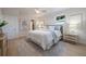 Inviting bedroom featuring a plush bed, soft linens, and warm natural light from a window at 243 45Th Ne Ave, St Petersburg, FL 33703