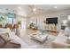 Bright and airy living room with modern decor, stylish furniture, and open layout to kitchen at 243 45Th Ne Ave, St Petersburg, FL 33703