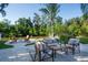 Beautiful patio features comfortable seating and lush landscaping, creating an inviting outdoor living space by the waterfront at 243 45Th Ne Ave, St Petersburg, FL 33703